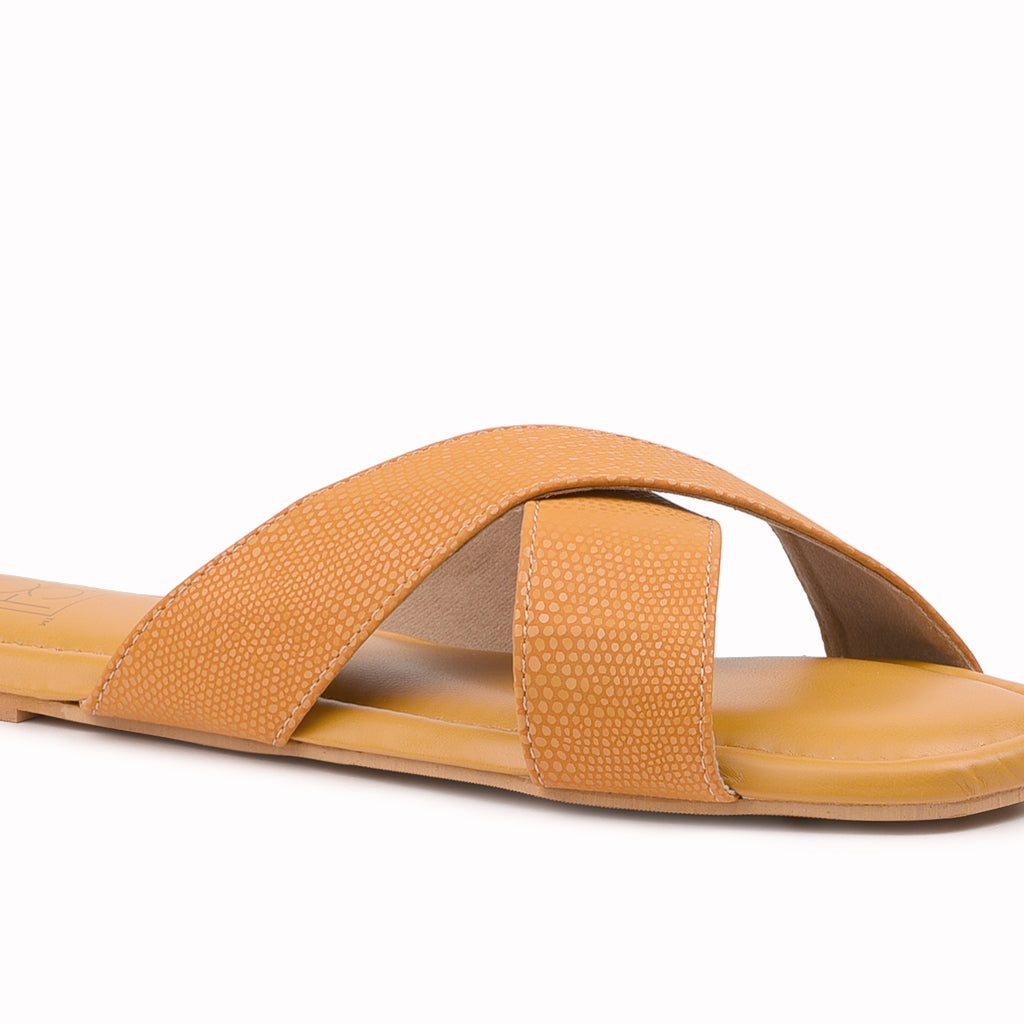 Noosh dew collection mustard color premium vegan leather handcrafted women fashion casual and formal  criss cross slippers sandals with soft cushion dual layer kooshcomfort insole and flexible rubber sole footwear. Comfortable, breathable, sustainable and eco-friendly