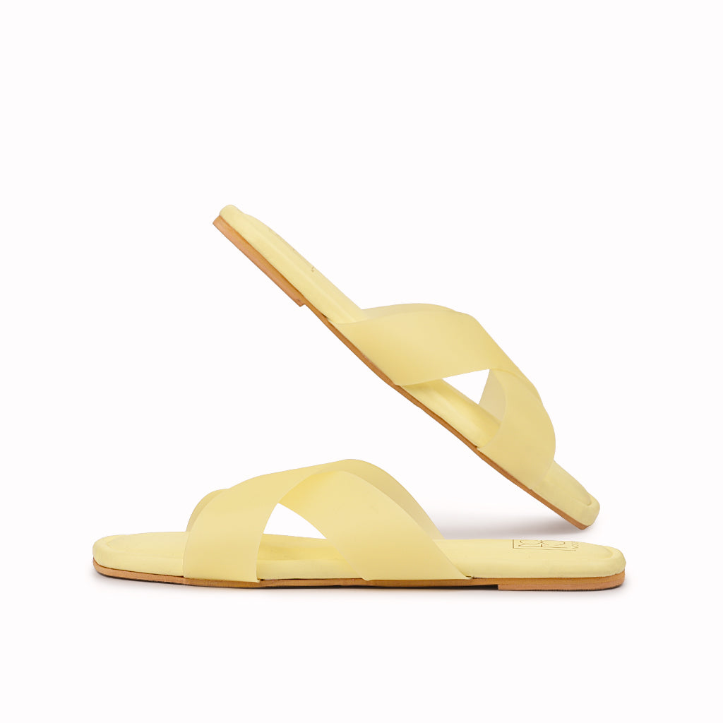 Noosh yellow color premium vegan soft TPU handcrafted women fashion casual and formal frost criss cross slippers sandals with soft cushion dual layer kooshcomfort insole and flexible rubber sole footwear. Comfortable, breathable, sustainable and eco-friendly