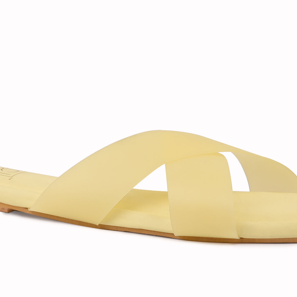 Noosh yellow color premium vegan soft TPU handcrafted women fashion casual and formal frost criss cross slippers sandals with soft cushion dual layer kooshcomfort insole and flexible rubber sole footwear. Comfortable, breathable, sustainable and eco-friendly